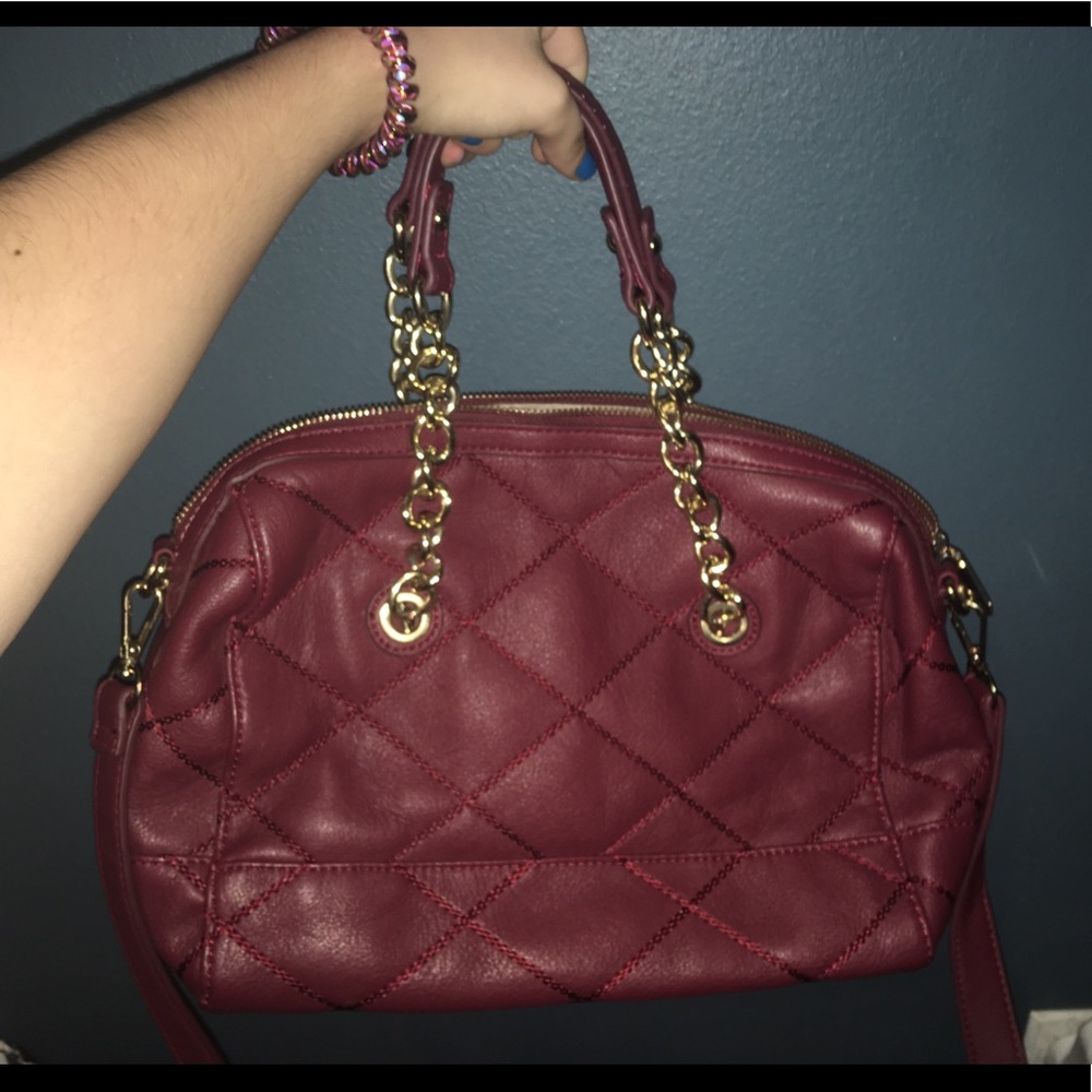 Charming Charlie’s maroon and gold purse.